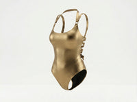 Gold Eclipse Swimsuit, styled front view — wrap-style one-piece for D–HH cups — Rimoné Paris